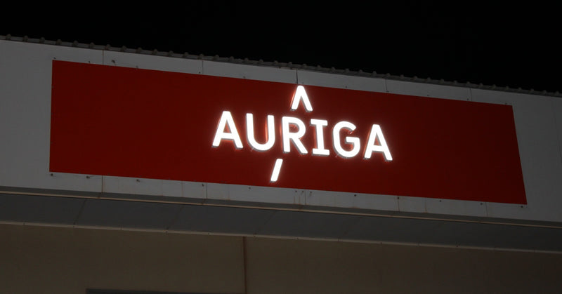 Illuminated AURIGA business signage installed on commercial building in Karratha WA by C Signs Pilbara