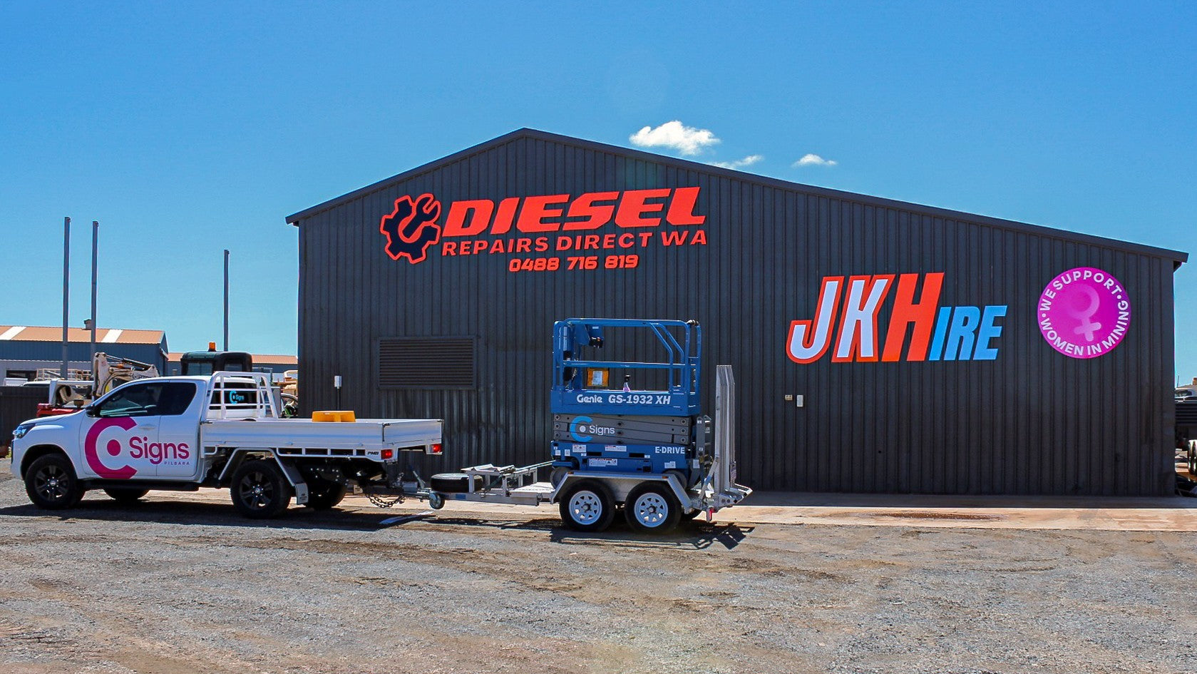 Commercial building signage for Diesel Repairs Direct WA and JK Hire, installed in Karratha by C Signs Pilbara.