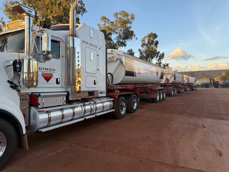 Road train for Dingo Concrete Services with branded decals and signage on every section, produced by C Signs in Karratha.