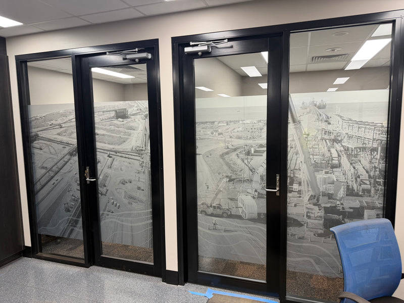 Frosted vinyl graphics applied to glass office doors and panels installed in the Pilbara by C Signs in Karratha