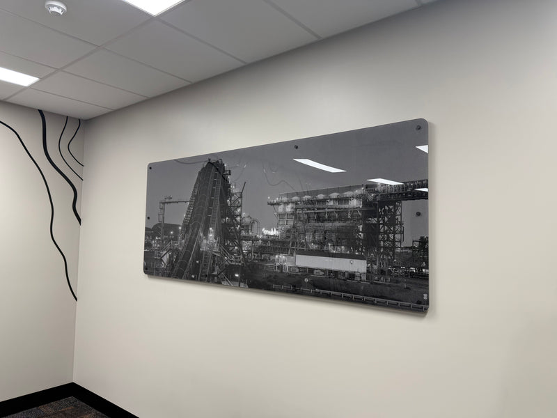 Black and white wall print mounted in an interior office space installed in the Pilbara by C Signs in Karratha