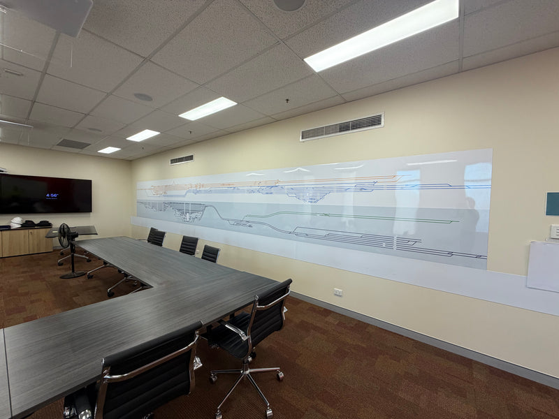 Large wall-mounted whiteboard installed in a meeting room interior in Karratha by C Signs Pilbara