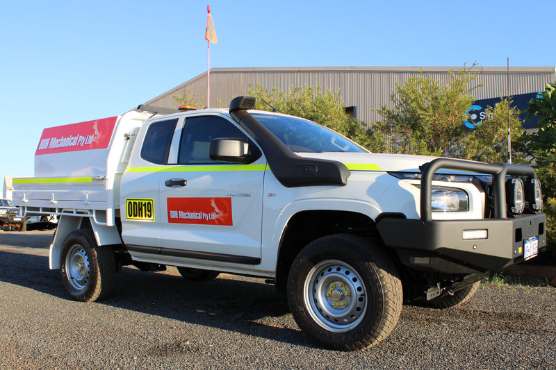 Orange vehicle decals with yellow reflective asset number signage for ODH Mechanical installed in Karratha WA by C Signs Pilbara