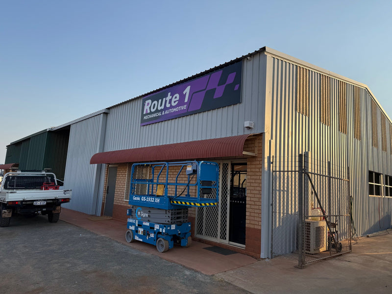 Route 1 Mechanical and Automotive commercial building signage installed on industrial warehouse in Karratha WA by C Signs Pilbara