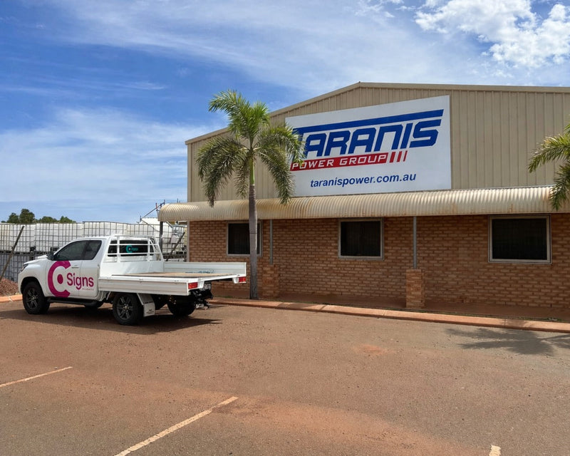 Taranis Power Group building signage installed on commercial warehouse in Karratha WA by C Signs Pilbara