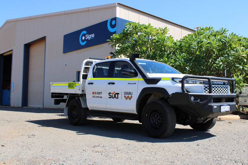Fleet vehicle graphics installed to new Toyota Hilux with reflective tape and assets in Karratha WA by C Signs Pilbara